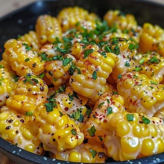 Corn cooked in a skillet with honey and butter